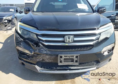 2016 Honda Pilot Touring z USA, uszkodzony, nr VIN 5FNYF5H93GB057063